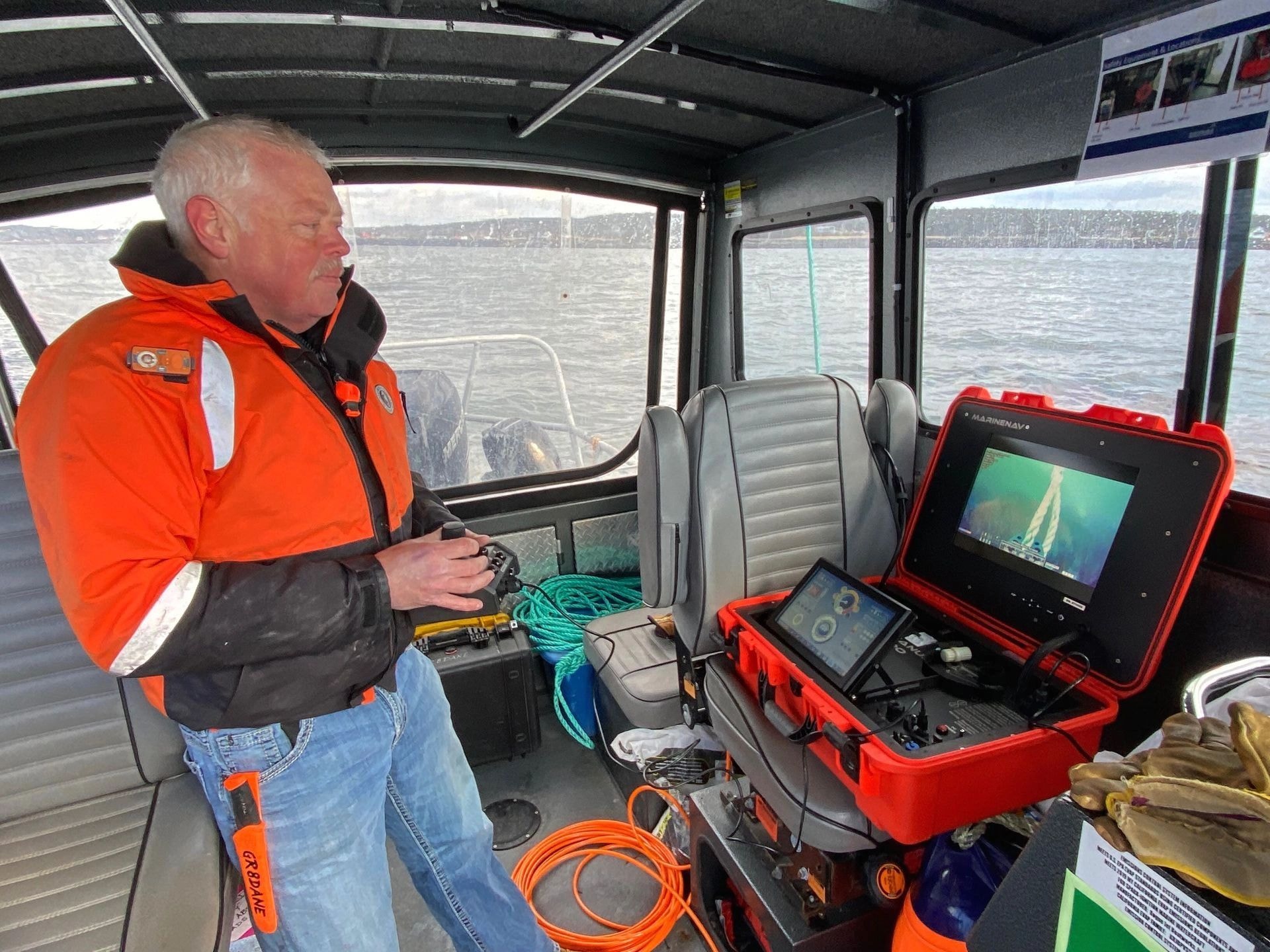 Operator at vessel navigation and control station